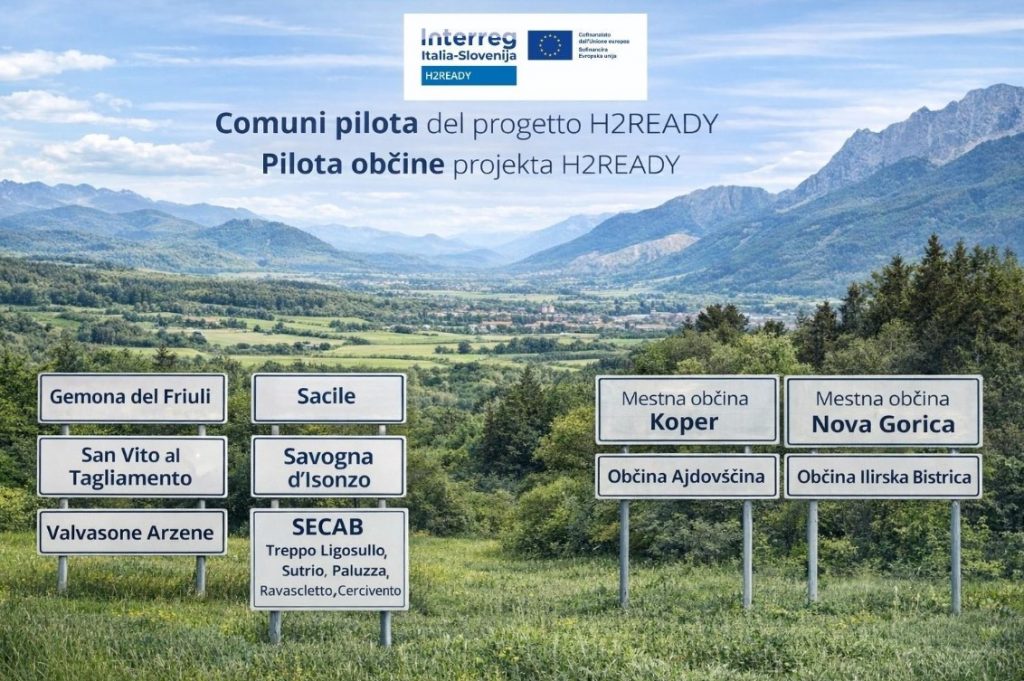 cartelli con indicati i nomi dei comuni che partecipano al progetto, sullo sfondo una valle e monti